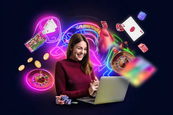A man celebrating a winning moment on his laptop while gaming symbols float around him, capturing the excitement of SPORTYBEF games.